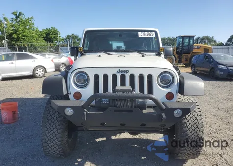 2010 Jeep Wrangler Rubicon z USA, uszkodzony, nr VIN 1J4BA6D18AL221240